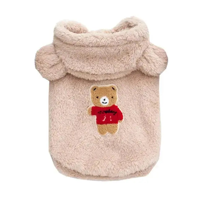 Ourson dans un sac à côté d’un sweat-shirt en polaire pour chiens - Protection hivernale